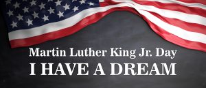 Martin Luther King jr day. I have a dream. USA flag on wooden ba